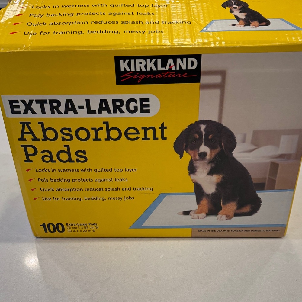 Kirkland Signature Extra-Large Absorbent Pads only a couple pads missing 1 pack.